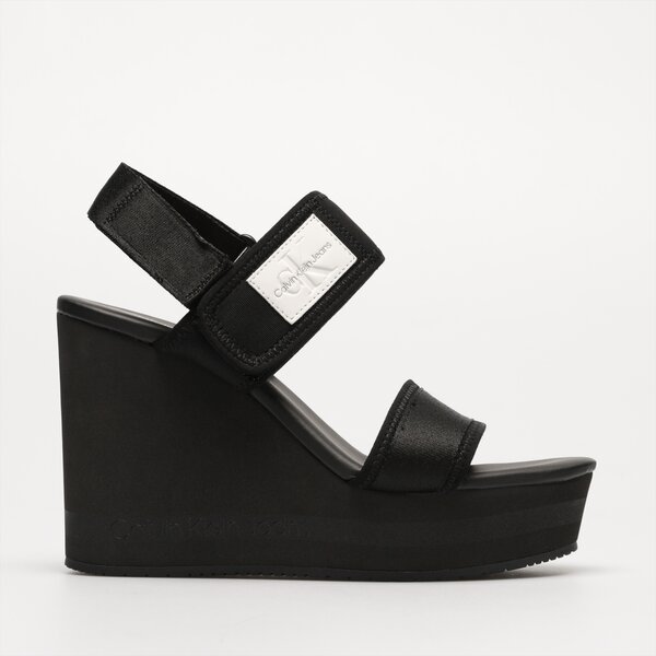 Damskie sandały CALVIN KLEIN WEDGE SANDAL BADGE yw0yw01028bds kolor czarny