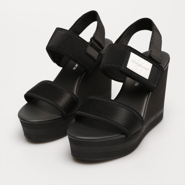 Damskie sandały CALVIN KLEIN WEDGE SANDAL BADGE yw0yw01028bds kolor czarny