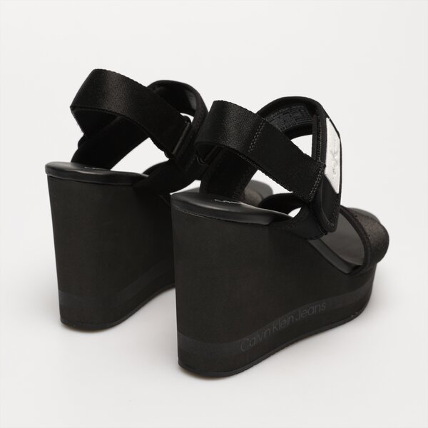 Damskie sandały CALVIN KLEIN WEDGE SANDAL BADGE yw0yw01028bds kolor czarny